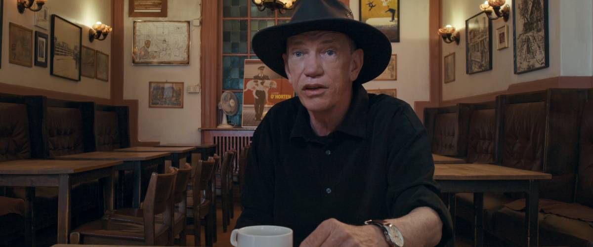 Rick Kirkham sitting in a diner