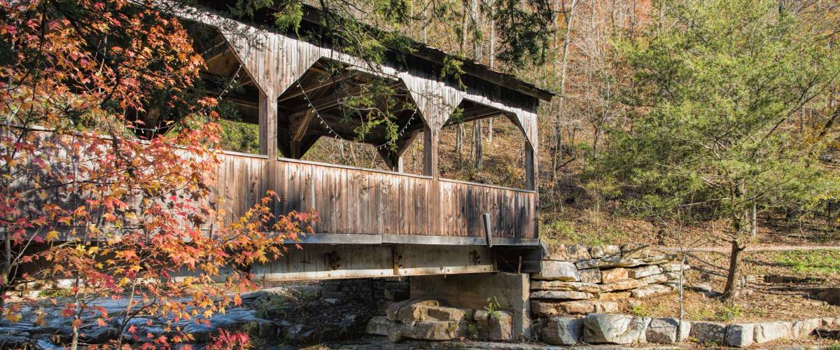 Rustic Wooden Covered Bridge in Autumn Near Ponca Arkansas in Ozark Mountains