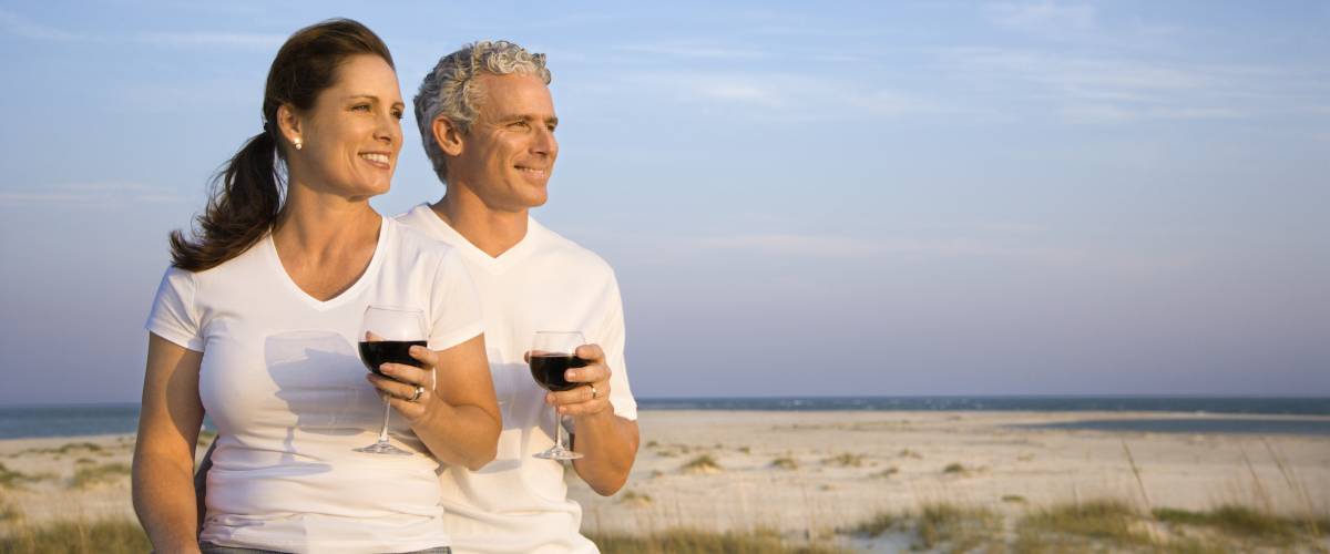Older couple enjoying the beach