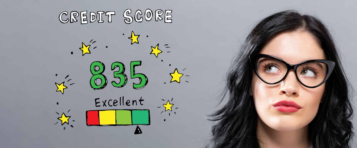 Excellent credit score with young businesswoman in a thoughtful face