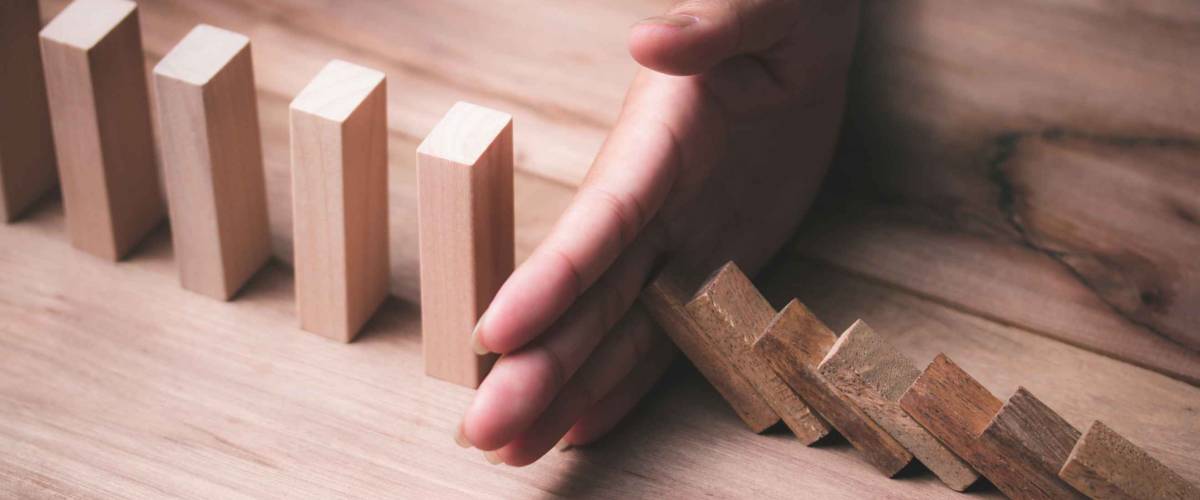 Stopping dominoes