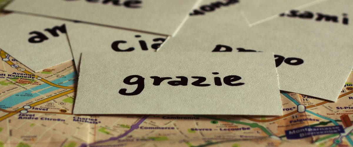 Italian flash card with the word Thank You on the map