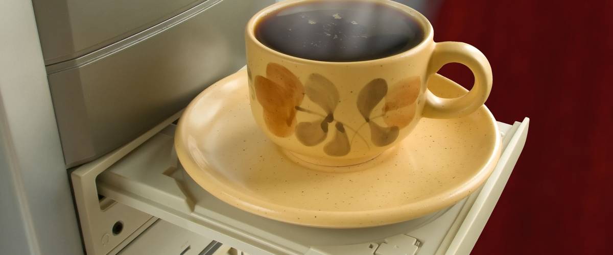 Support for cup of coffee (open cdrom drive)