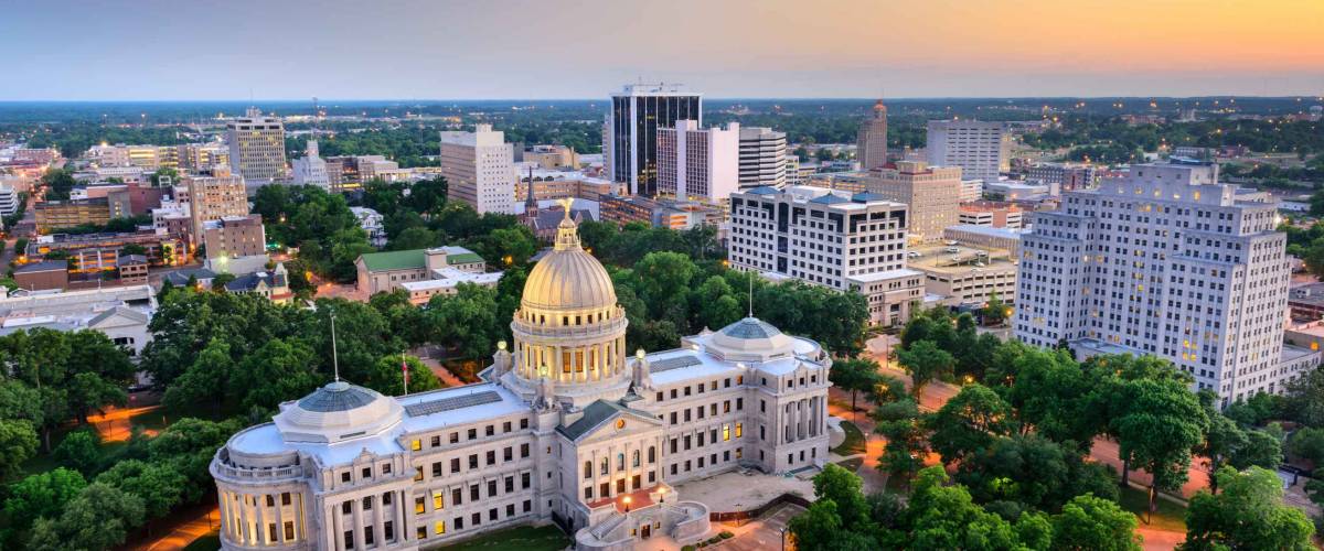 Jackson, Mississippi, USA cityscape at dusk.