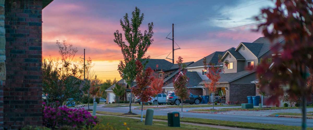 Living in Residential Housing Neighborhood Street at Sunset in Bentonville Arkansas