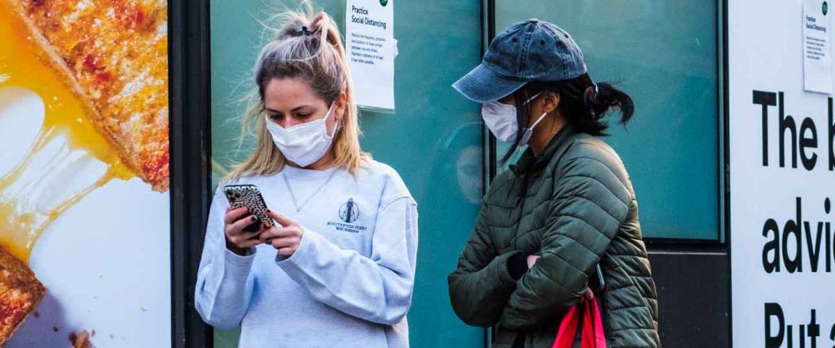 NEW YORK, NEW YORK - APRIL 01, 2020: A long line outside of Whole Foods in Tribeca, New York as the store has implemented social distancing measures during the COVID-19 pandemic.
