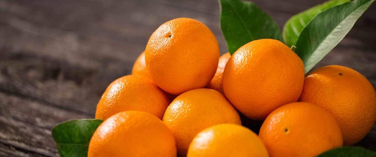Healthy fruits, orange fruits background many orange fruits - orange fruit background