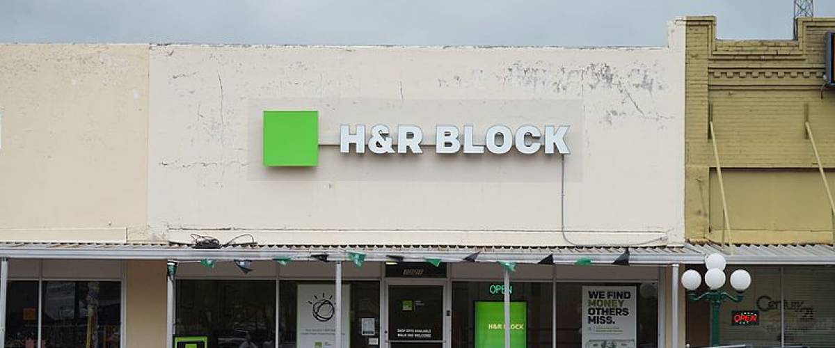 Battered looking H&R Block location.