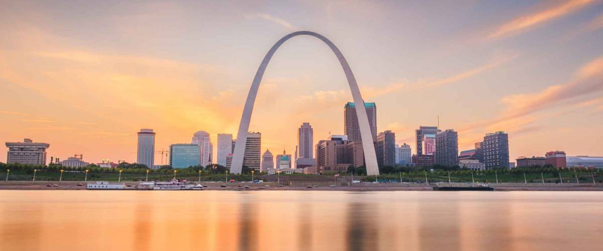 St. Louis, Missouri, USA downtown cityscape on the Mississippi River at twilight.