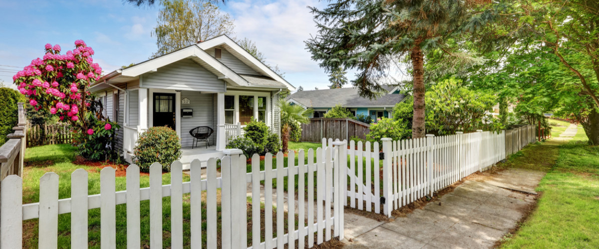 Cute craftsman home exterior with picket fence. Northwest, USA