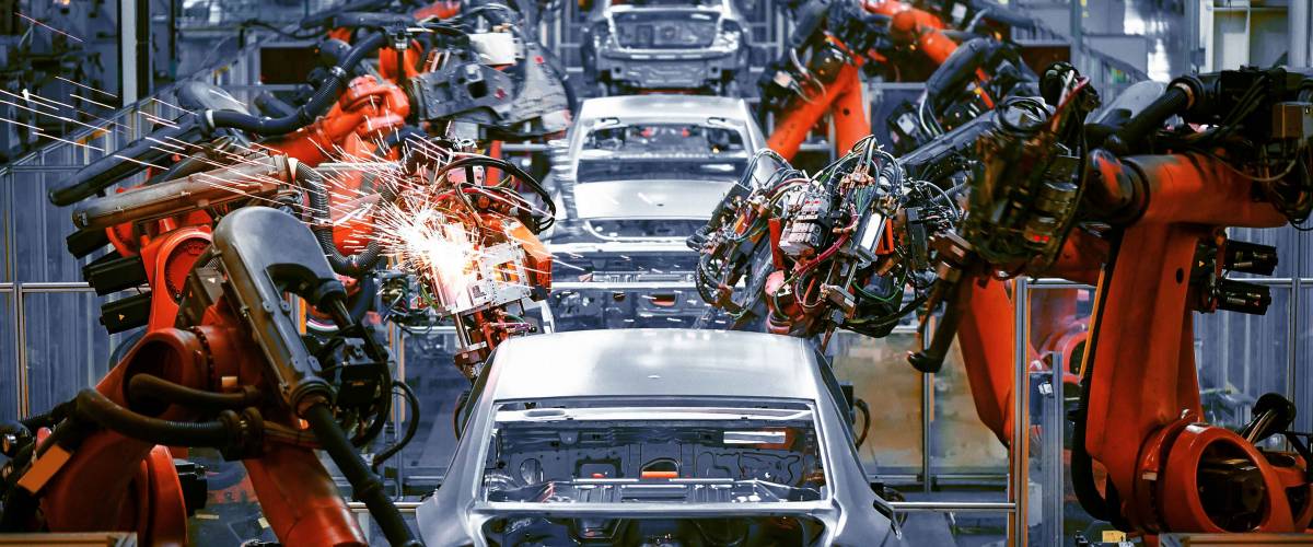 The welding arm on the automobile production line is being welded