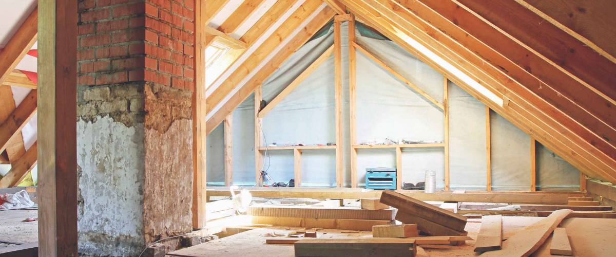 an interior view of a house attic under renovation