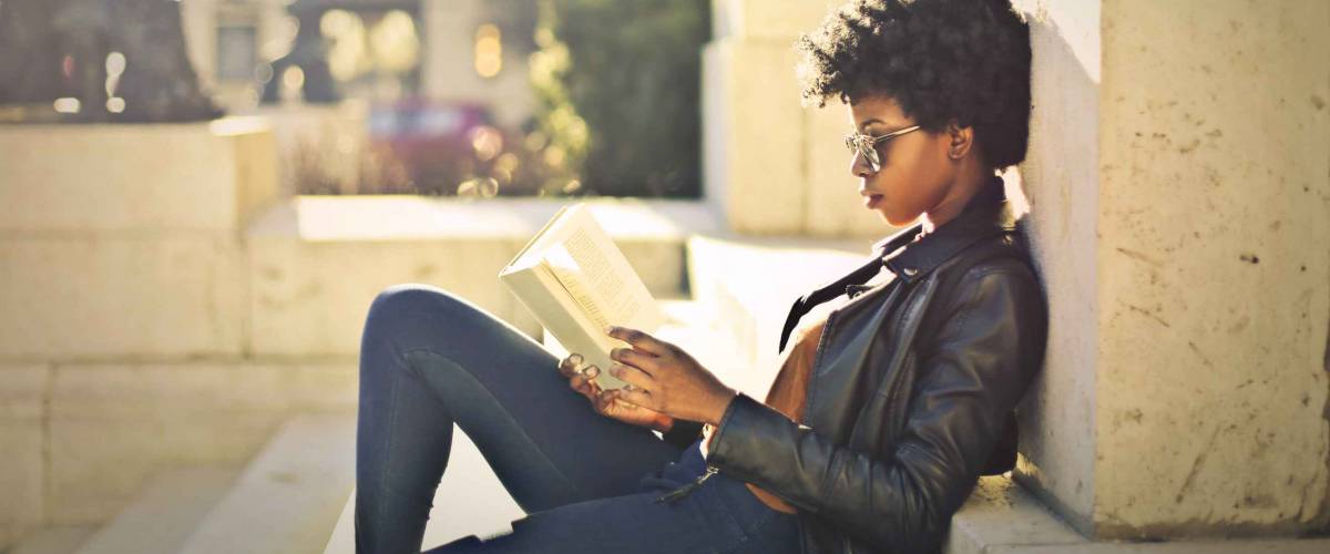 Woman reading outdoors