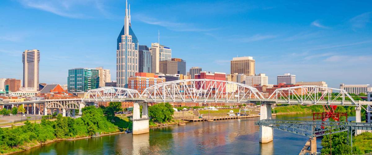Nashville, Tennessee, USA downtown city skyline on the Cumberland River.