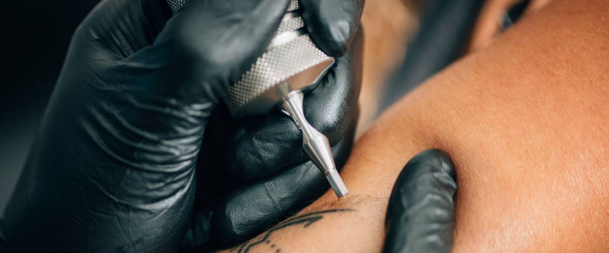 Getting a tattoo. Close-up, toned image