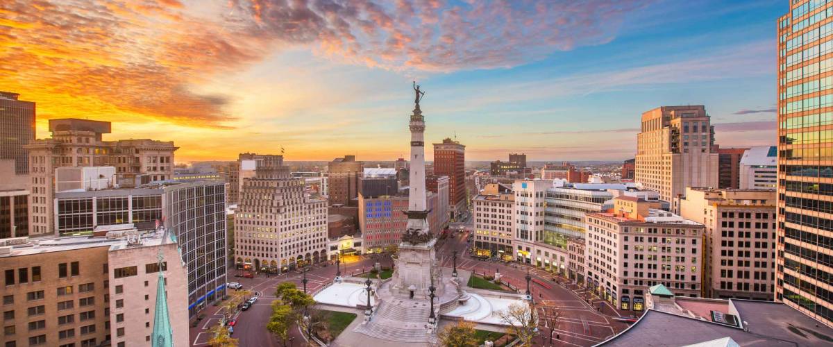 Indianapolis, Indiana, USA skyline over Soliders' and Sailors' Monument at dusk.