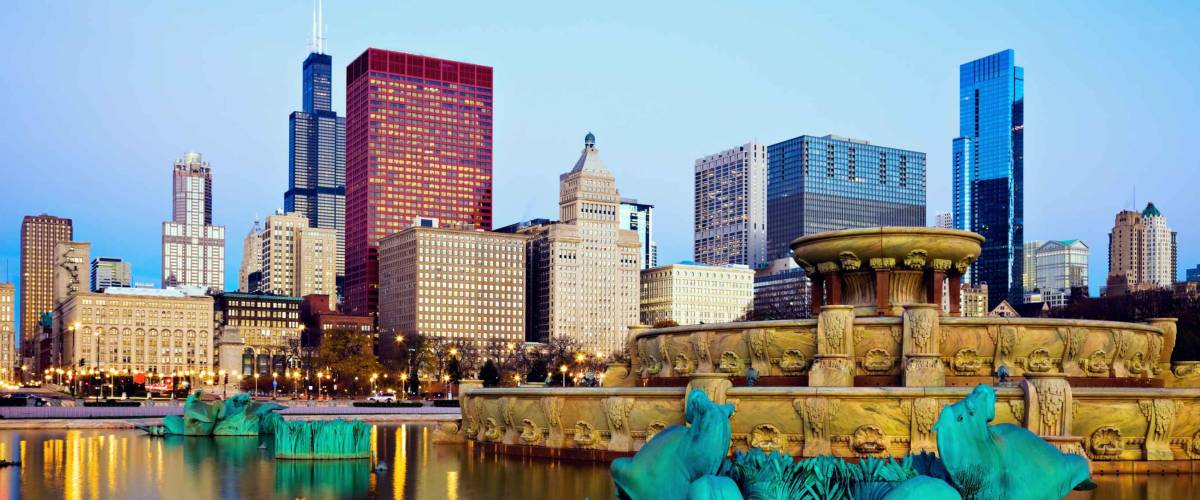 Chicago skyline reflected in Buckingham Fountain. Chicago, Illinois, USA.