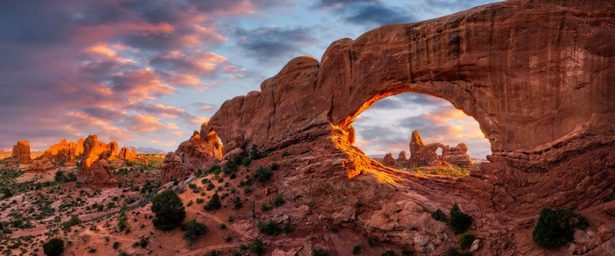 Evening light over North Window with Turret Arch in the distance, Arches National Park Utah