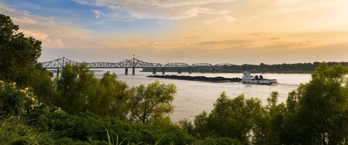 A pusher boat in the Mississippi River near the Vicksburg Bridge in Vicksburg, Mississippi, USA.