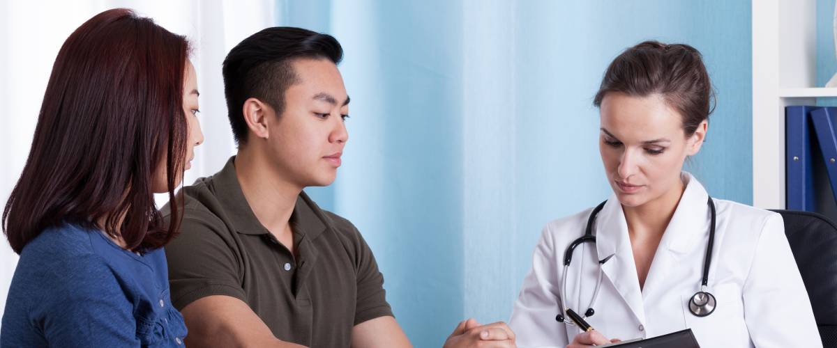 Couple in doctor's office