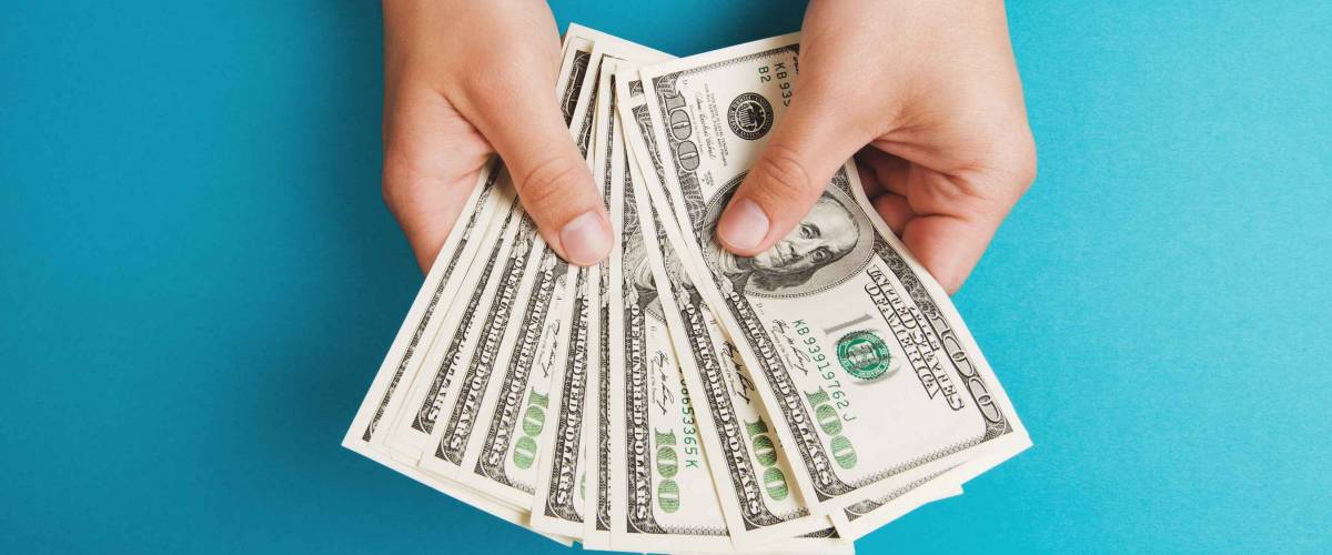 Man counting money, economy concept, allocation of money