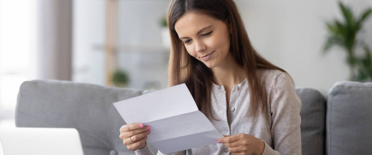 Woman looking at document