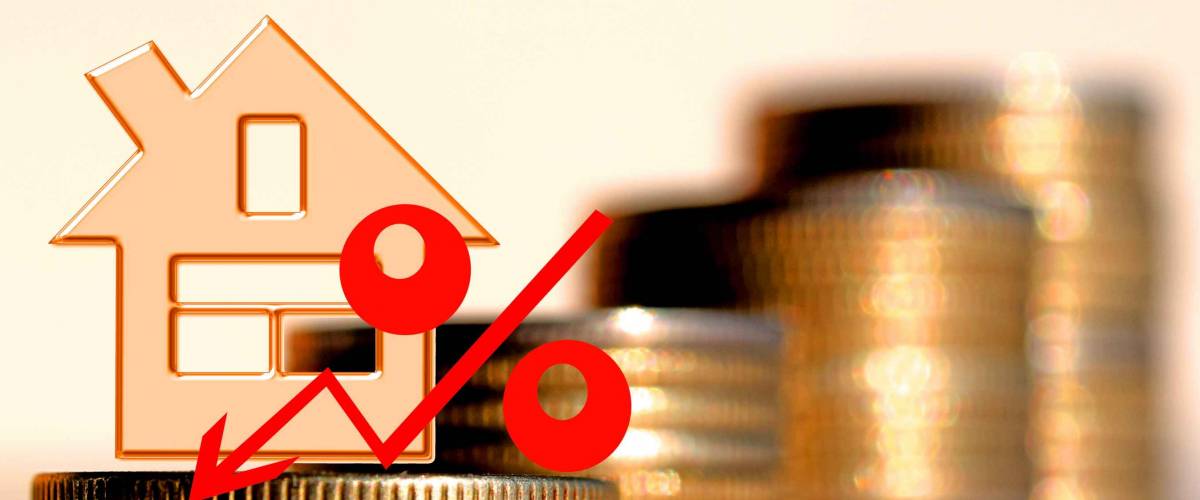 Red percent sign on a background of money . The concept of changing prices on the market