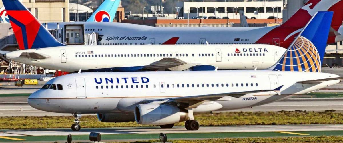 Los Angeles airport overview with United airbus Delta boeing passenger planes side by side