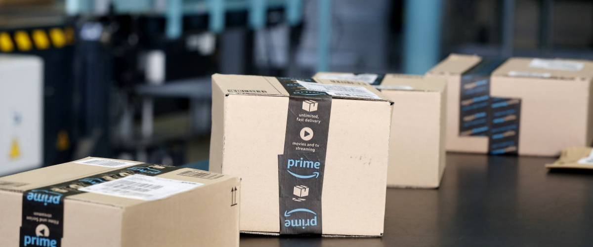 Amazon Prime packages on a conveyer belt at a warehouse