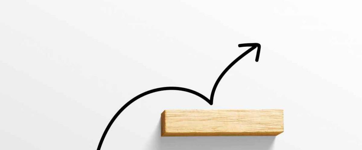 rising arrow on staircase, increasing business