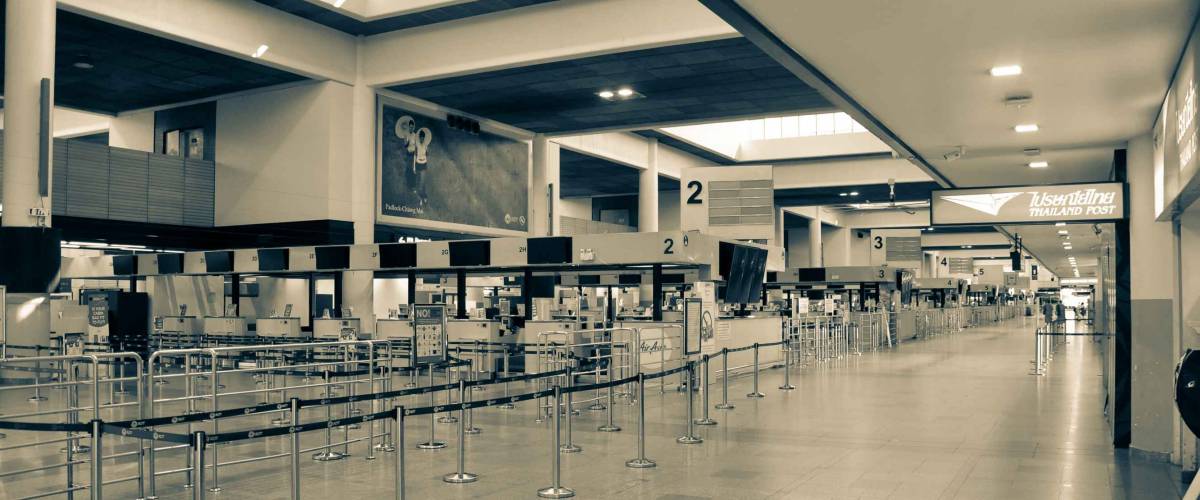 Empty airport terminal Airlines stopping an operations, Check-in counters in the terminal at Don mueang International Airport closed during coronavirus disease (Covid-19).
