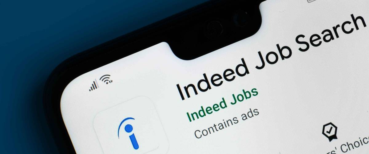 Indeed Job Search app seen on the corner of mobile phone.