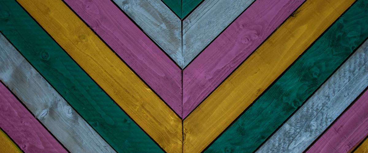Colorful vintage old wooden plank wall texture background. Creative Wood Background. V Shaped, Symbol V, victory, Copy Space, Selective focus.