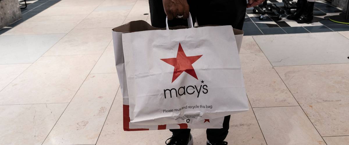 Closeup of Macy's shopping bag, being held by person out of frame