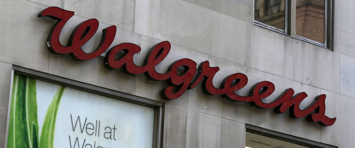 Closeup of Walgreens sign on concrete building