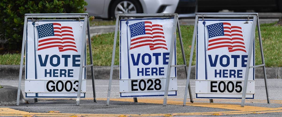 Vote here signs