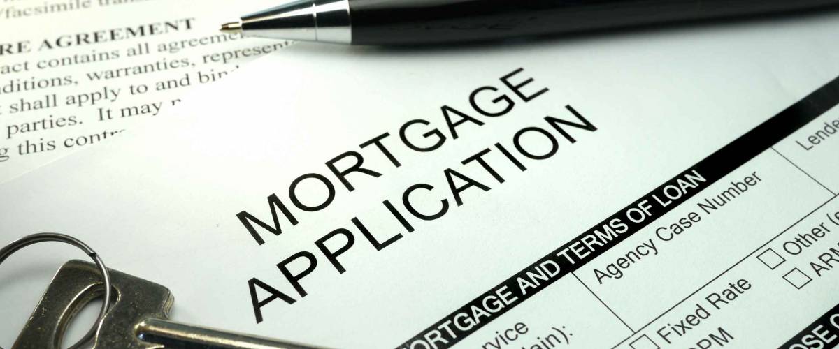 pen and key on mortgage application form