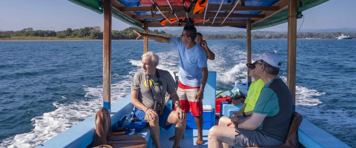 GULFO DULCE, COSTA RICA - FEBRUARY 5, 2016: Eco-tourists on boat tour, near Osa Peninsula.
