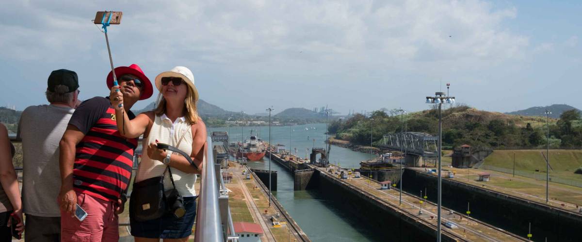 Panama City, Panama - march 2018: Tourist couple, taking selfie picture Panama Canal, Visitor Center, Miraflores Locks, Panama City