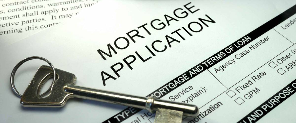 pen and key on mortgage application form