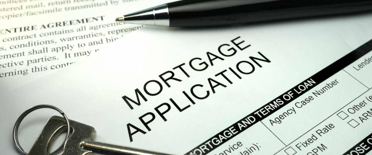 pen and key on mortgage application form