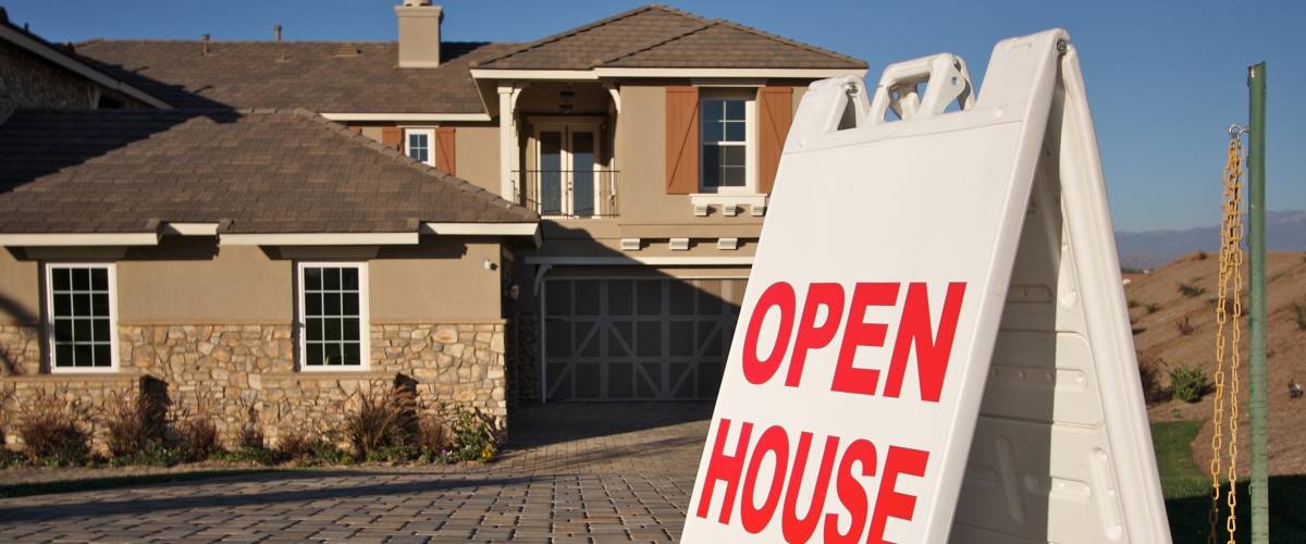 open house sign outside a house
