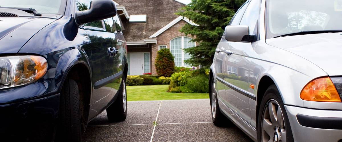 modern suburban family life - 2 cars & a house