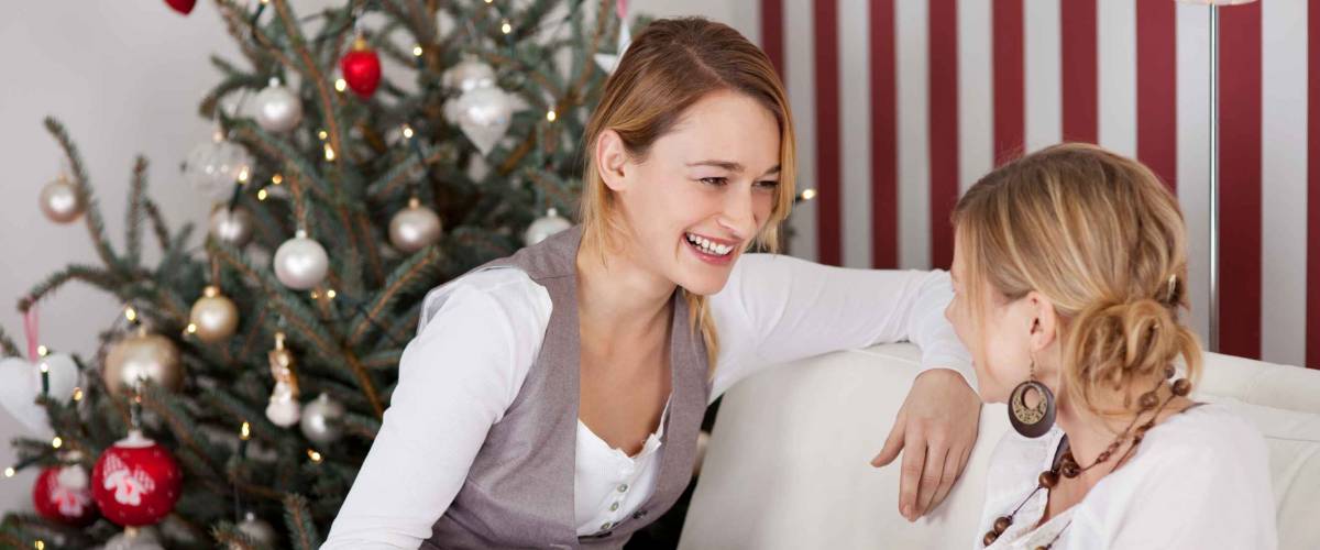 women talking and drinking coffee on christmas day