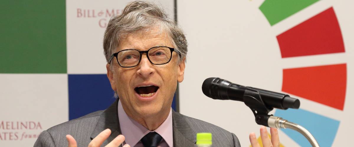 Bill Gates talking into microphone
