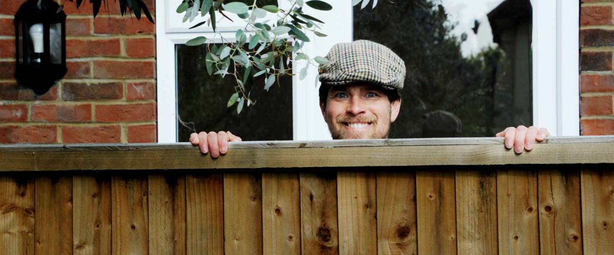 Nosy Neighbor Looking Over Fence