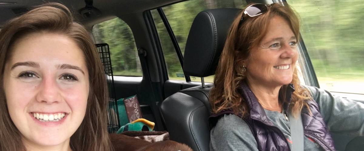 Mom and daughter driving