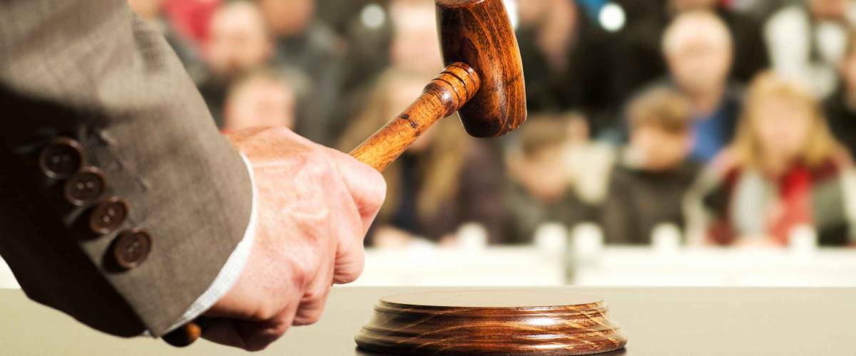 auction bid sale judgment mallet with judge and public