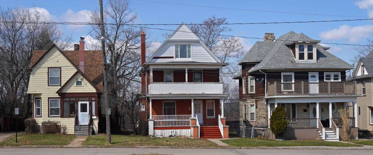 row of older houses in American suburb