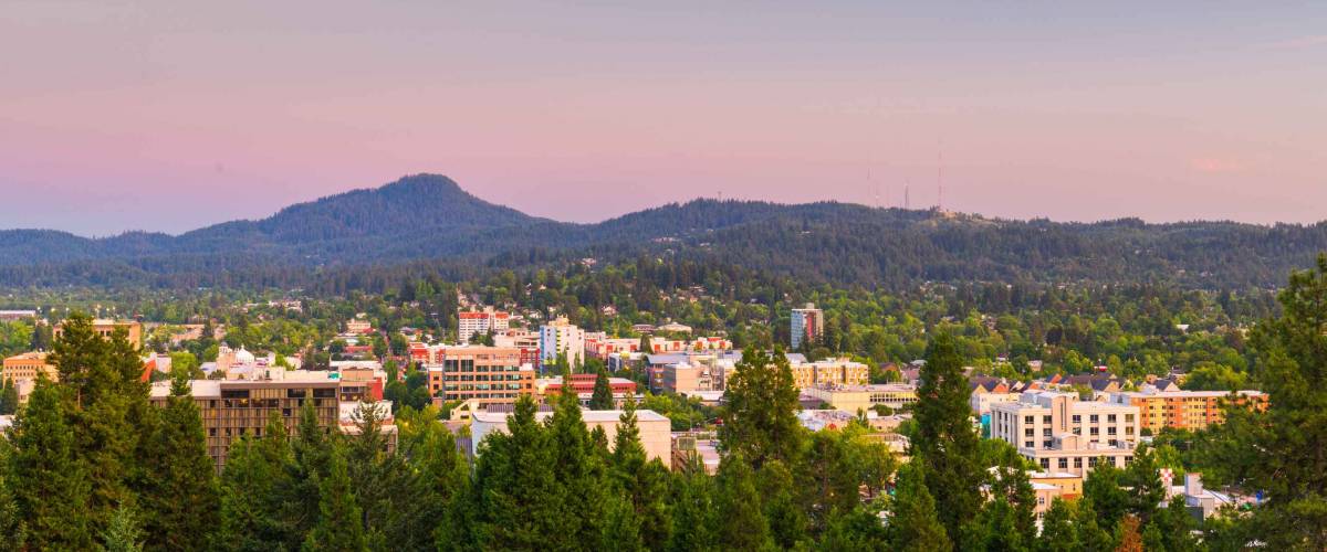Eugene, Oregon, USA downtown cityscape at dusk.